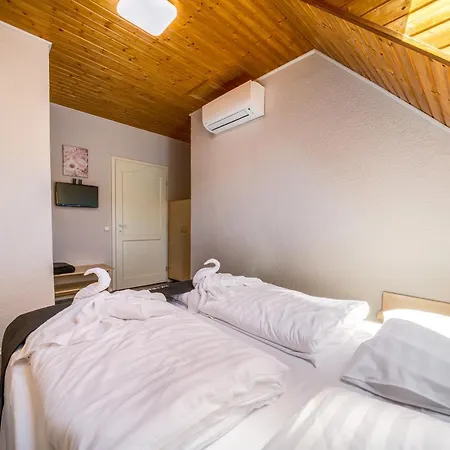 Апартаменты Helka Apartmanhaz Балатонлелле